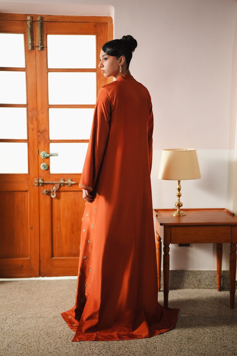 Amber, burnt orange gown