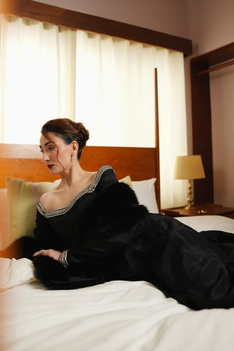 Delara, black gown