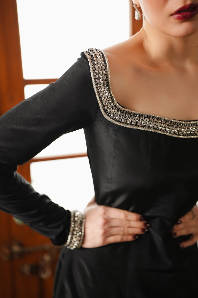 Delara, black gown