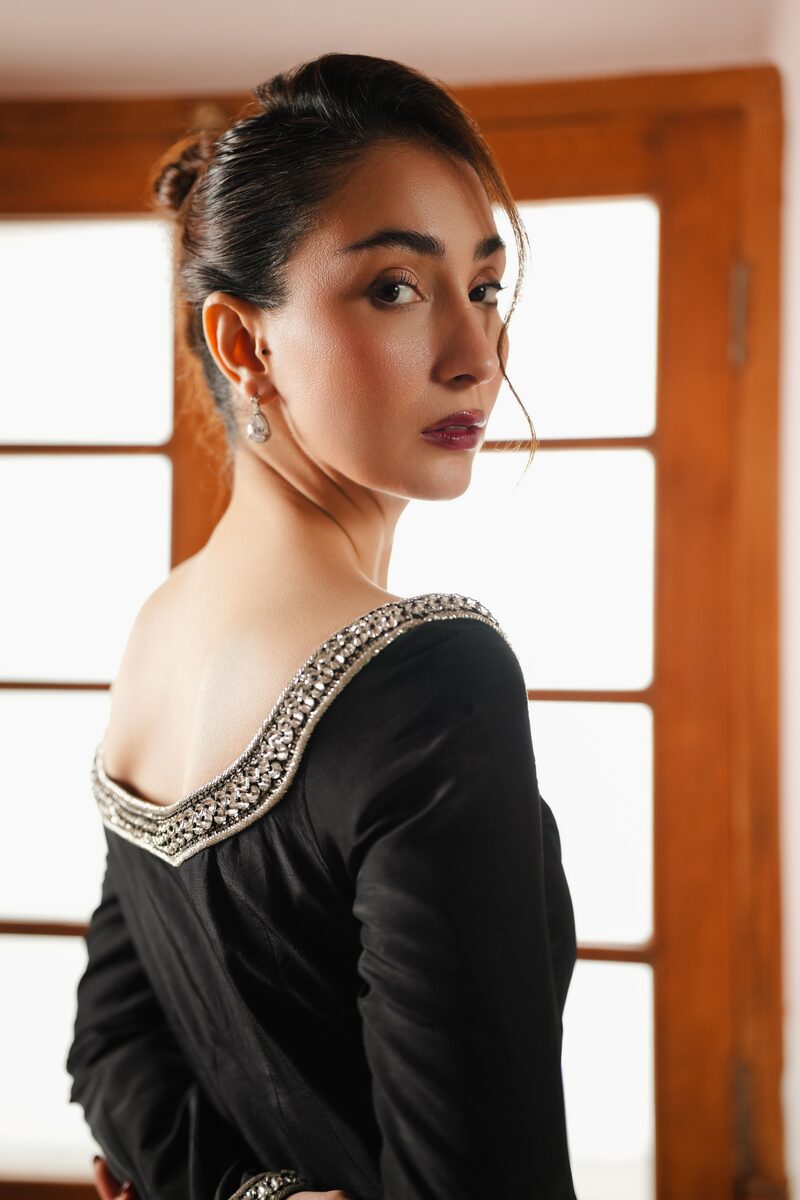 Delara, black gown