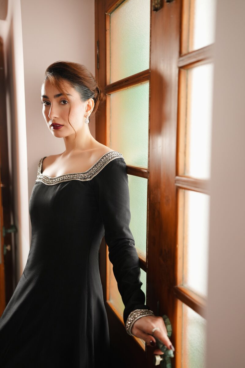 Delara, black gown