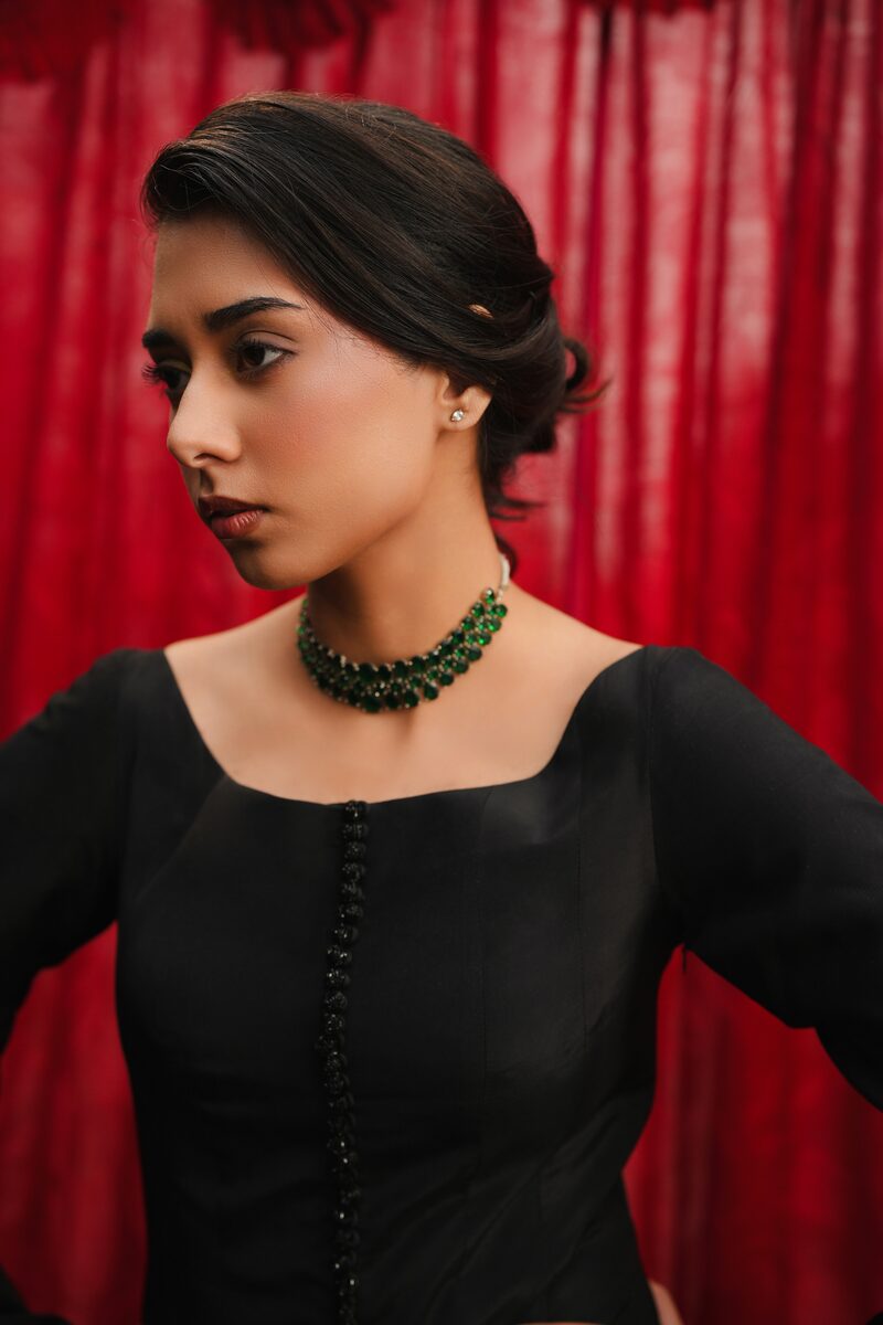 Misk, black gown