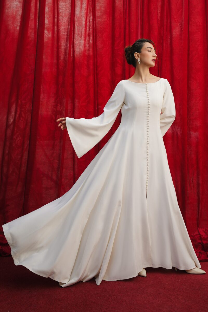 Noura, white gown