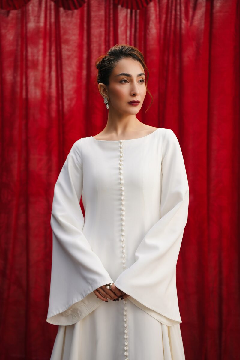 Noura, white gown