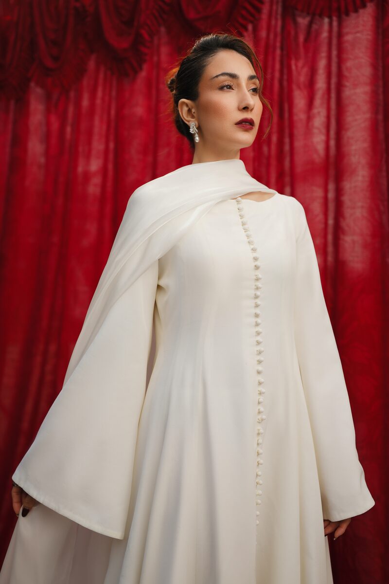 Noura, white gown